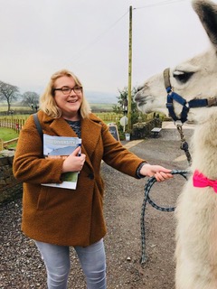 Victoria Galligan with Llama from Farm Diversity Live 